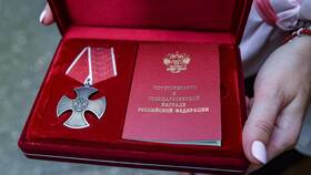 Как получить выплату за орден Мужества